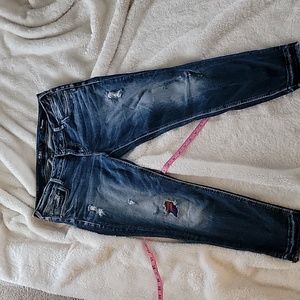 Distressed/ mid but on the low rise side jeans